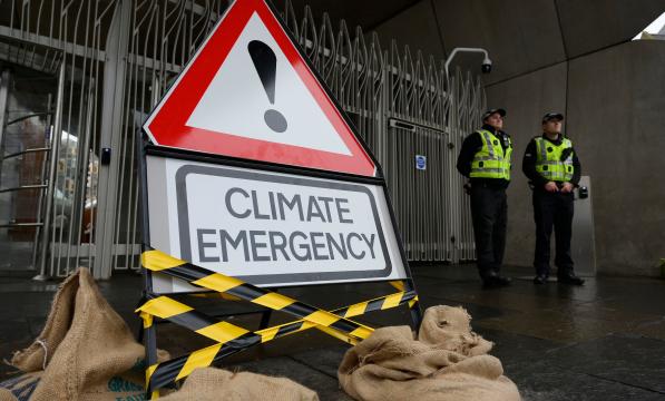 Climate emergency warning sign outside the Scottish Parliament