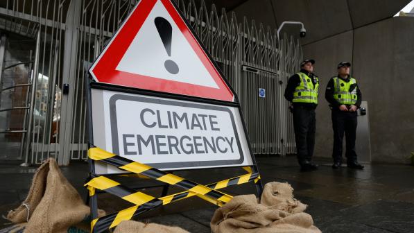 Climate emergency warning sign outside the Scottish Parliament