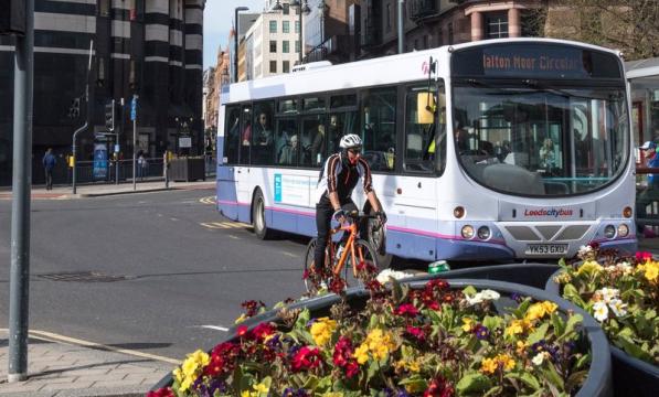 Cyclist and bus