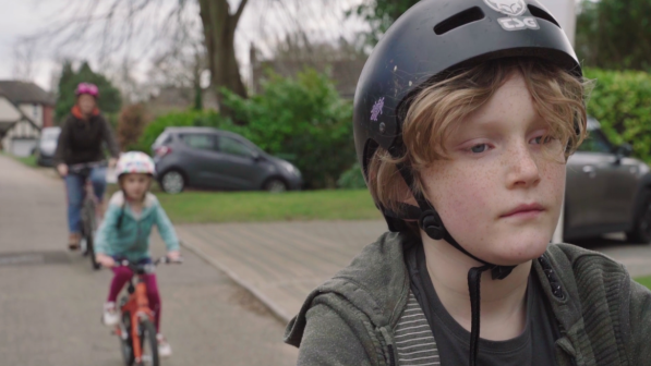 Family cycling on quiet roads