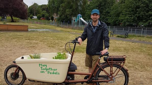 Colin with Dolly the e-cargo bike in the park