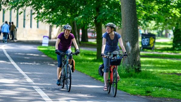 Women cycling to work