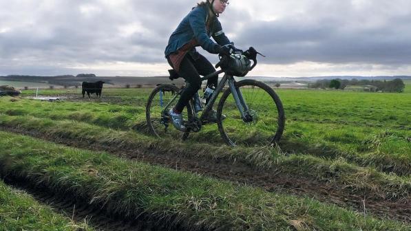 Woman riding in a field