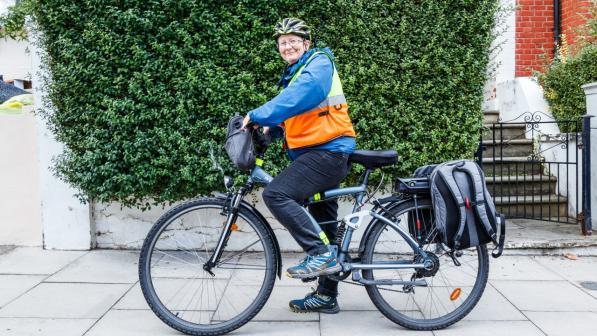 Woman cyclist on her bike