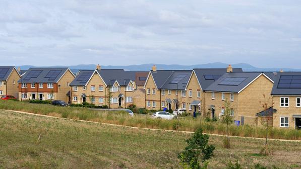 Car-dependent new housing (photo CC David Dixon)