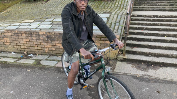 Man sitting on bike