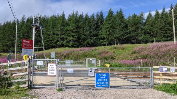 traditional level crossing with locked gates