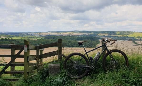 Bike in front of view of rolling fields