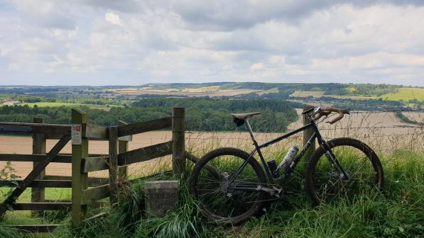 Bike in front of view of rolling fields