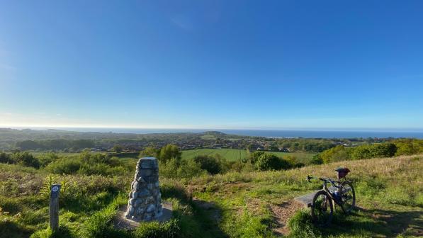 View from a hill top with trigpoint