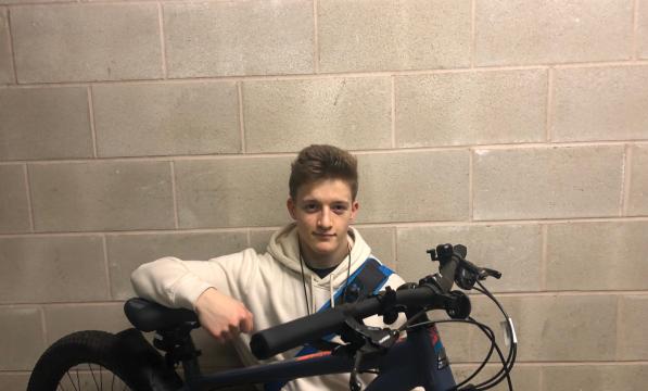 young man with bike