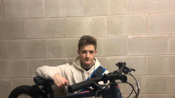 young man with bike