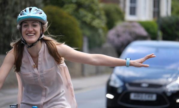 Cyclist signalling to turn left