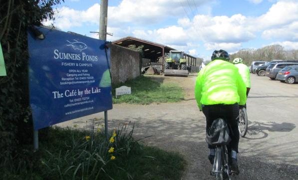 Cycling through the entrance to Sumners Ponds