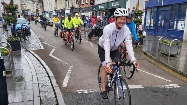 A mass cycle ride through Wells city centre, Somerset