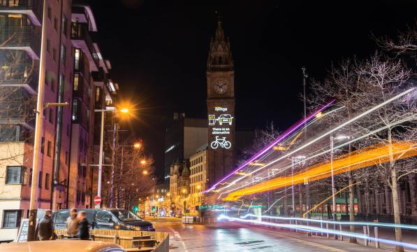 The charity Cycling UK lights up the historic Albert Memorial Clock in Belfast with the pro-cycling message "There is an alternative" on March 31, 2022.