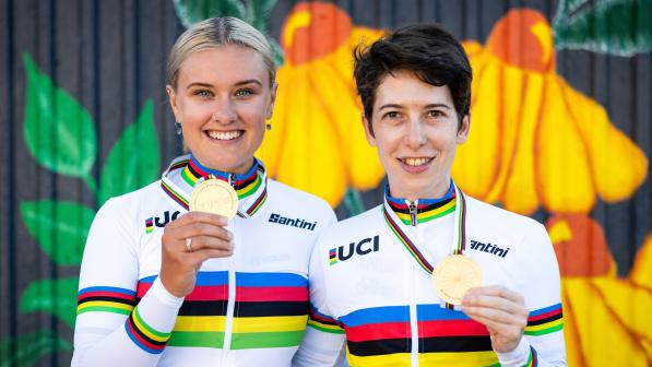 Sophie Unwin (right) and Jenny Holl (left) hold up their medals after winning gold in the Women’s Tandem Trial at the UCI Para-cycling Road World Championships. Credit: SWPix