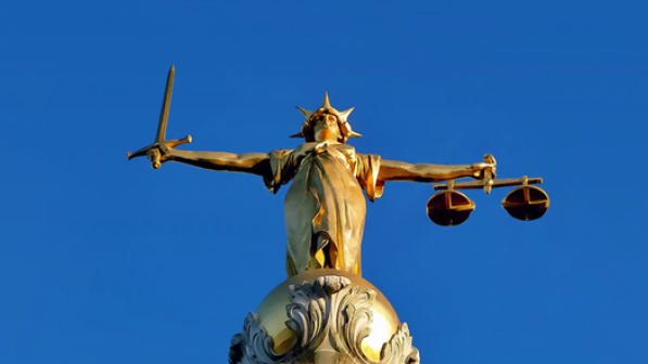 Scales of Justice (cc Wikimedia Commons)