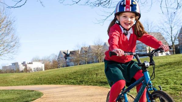 A child cycling to school