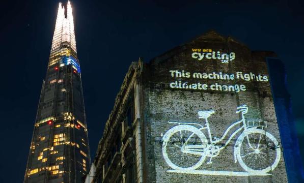 Projection of a cycle on a building in London