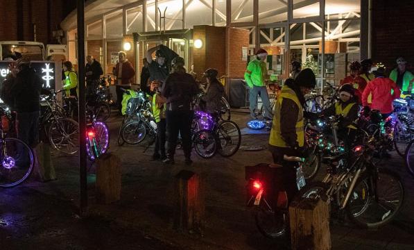 Cyclists at a glow ride event