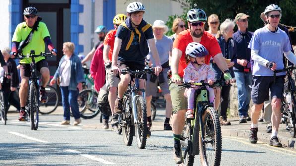 Cycle riders at Lon Las Mon launch rally in Llangefni, May 2023