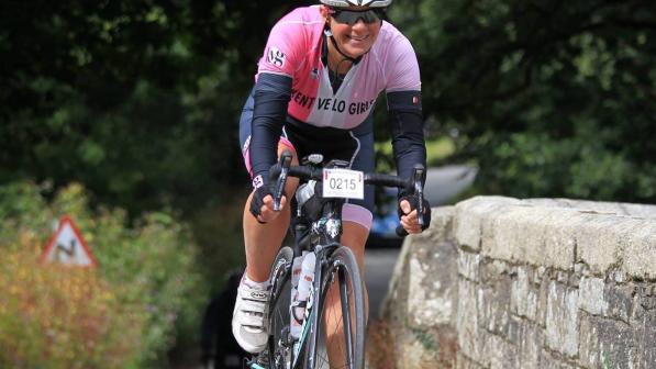 Head shot of Clare Midgley selected as a sporting hero in Cycling UK's 100 Women in Cycling 2024 The first person to ever complete Chase The Sun Grand Slam