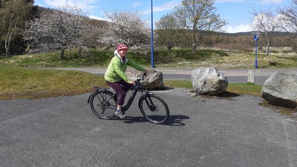 ACE participant on an ebike outside