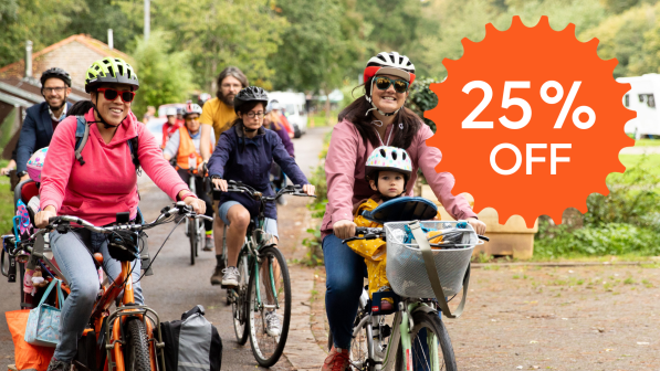 A mixed group of people on bikes smiling and riding together. The text reads '25% off'