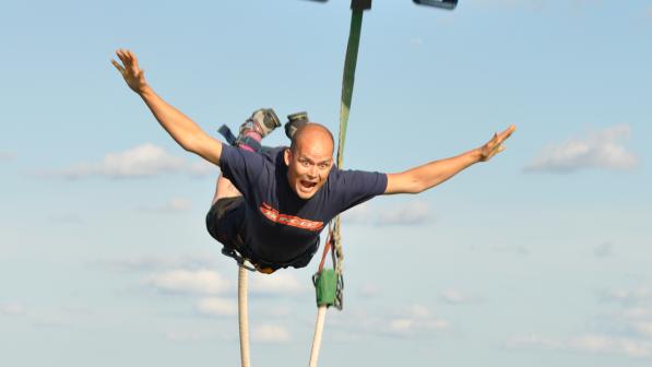 Man taking part in a bungee jump