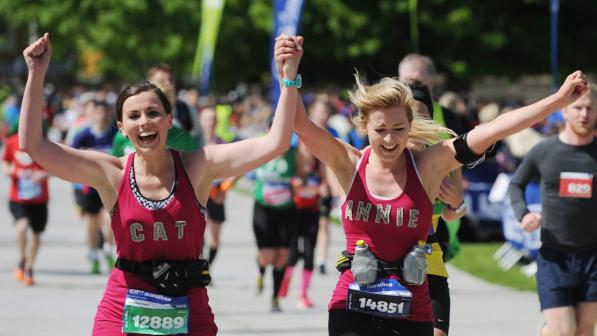 Two women running in a marathon