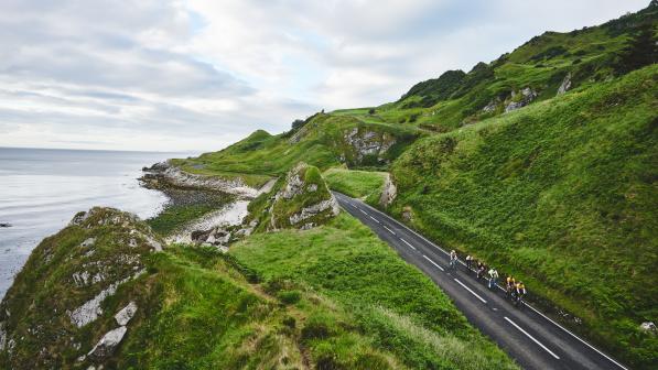 Group of cyclists on Antrim coast road in Northern Ireland (c) Joe Branston/Chase the Sun