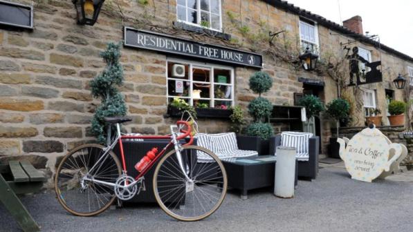 A retro 1980's bike outside a pub 