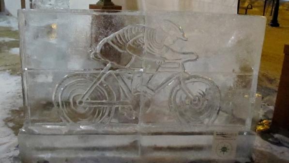 An ice sculpture showing a person on a bike